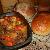 The stew was cooked in a clay pot. It includes chopped beef, potatoes, celery, and carrots, garlic, onions, basil, rosemary, fresh bay leafs, chicken stock, flour, tomatoe paste, sea salt and pepper. 